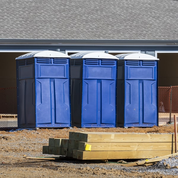 what is the maximum capacity for a single portable restroom in Adrian